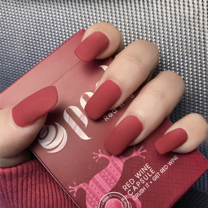 August Nail Colors| Finished manicure with false nails