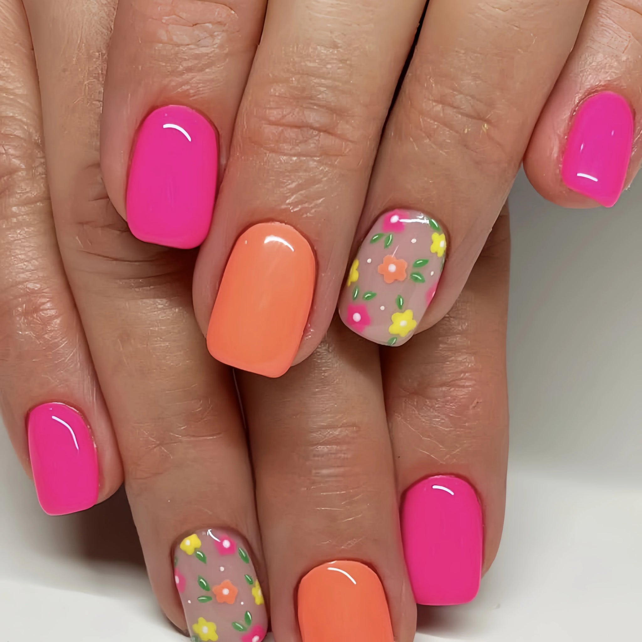 Short pink and orange square nail stickers for spring and summer